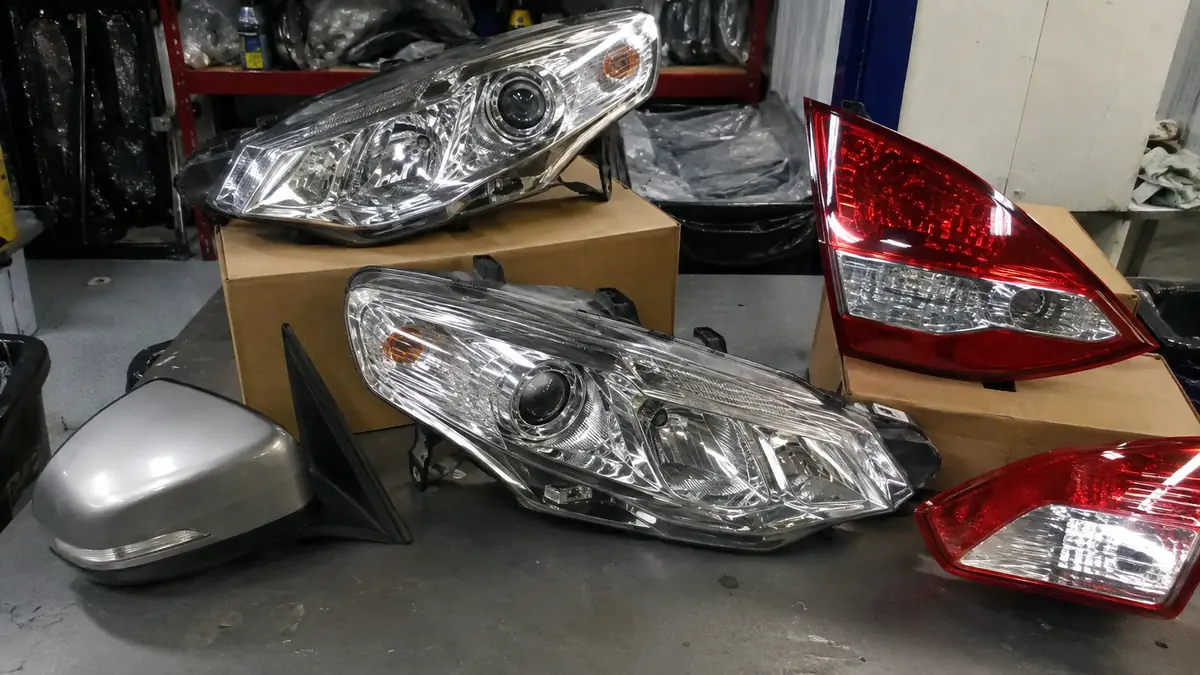 Headlights, Taillights & Mirrors for sale at an auto car parts store in Dallas