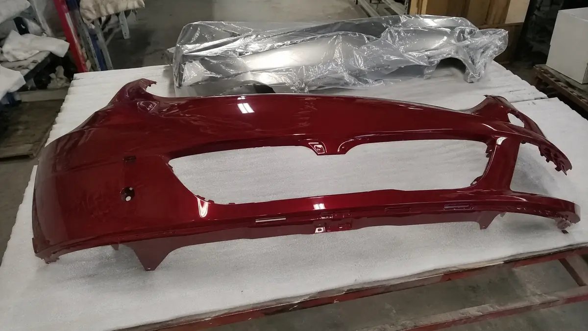 Pre-Painted Body Parts for sale at an auto car parts store in Dallas